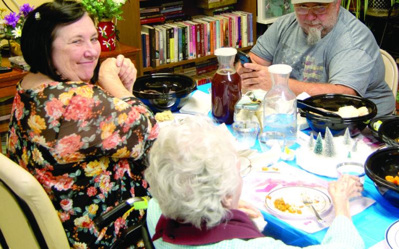 Residents of Medicalodges visited with family members and friends at the recent holiday dinner.