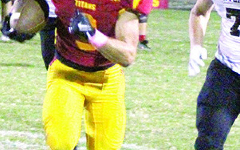 Titan Senior, Jayden Rodriguez, scored both Titan touchdowns and collected 145 yards on passes from senior, Jett Tanner, in the Friday night district loss to Frontenac, 14-41, at Titan Stadium.