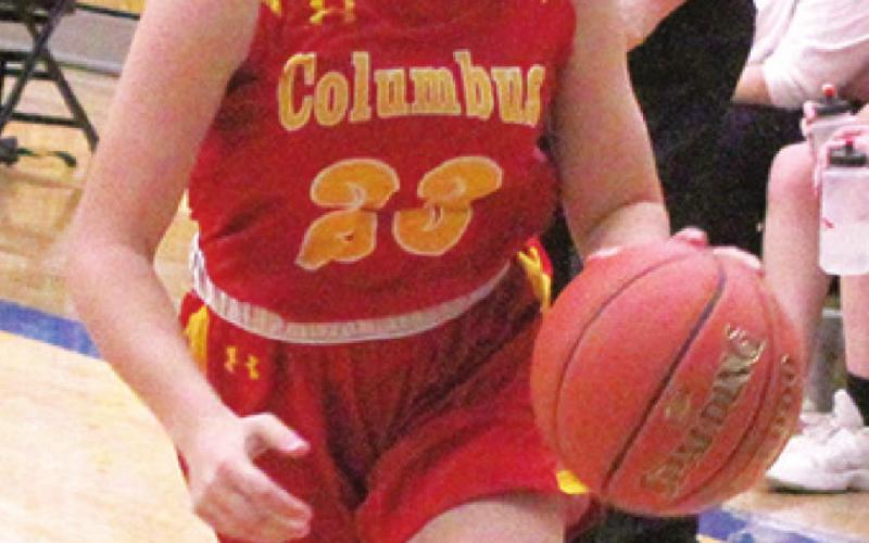 Lady Titan Sophomore, Katie Mooney, drives to the basket during the Columbus, 31-28, win over the Lady Rams in Riverton, Friday. Katie scored six points in the varsity contest and two in the junior varsity, two-quarter, match up.