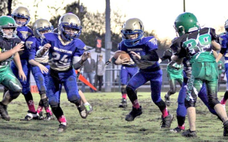 Third and fourth grade Riverton Rams coasted over the Quapaw Wildcats Saturday night scoring 41 points. The Rams going into playoff with a 6-0 record. The Playoff game will be Saturday, November 6. Hayze Thomas carrying for the touchdown. Courtesy photo.