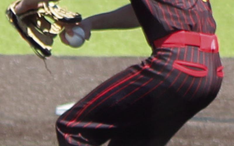 Cal Saporito, Titan Senior, came in as relief on the mound during the 8-1 loss to Dibble, Okla., Saturday, in Seneca, Mo. as part of the Wyandotte Baseball Festival. Cal covers right field stealing hits from the foul line to right-centerfield when not pitching.