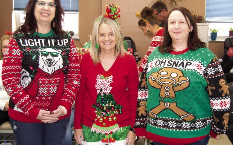 During the Courthouse Christmas Party Ugly Sweater Contest two of the winners were from the County Clerk’s office. Appraiser Delinda White, Michelle Mosler and Cassie Spoonmore.
