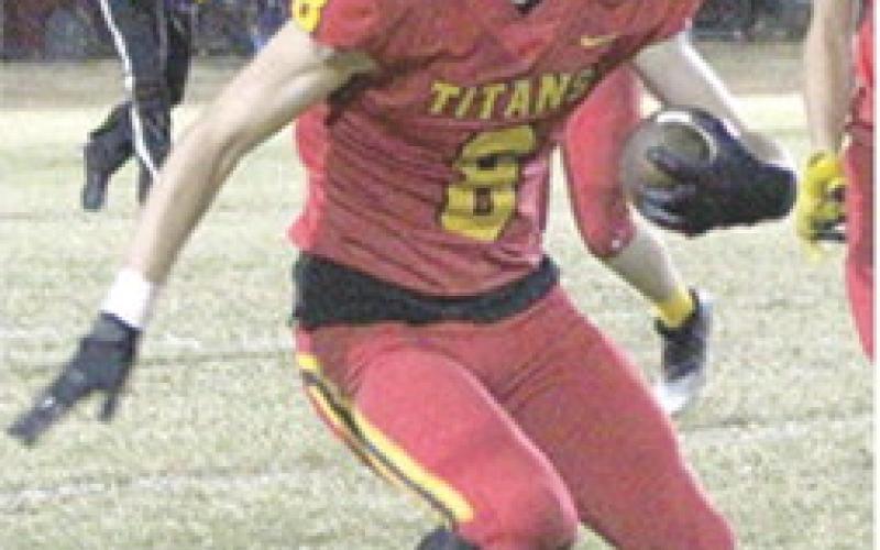 Titan Senior, Jace Midgett, returns his second interception of the game in the 21-0, Columbus shut out over the Parsons Vikings in round one of the Kansas State Class 3A Playoffs, Friday, at Titan Stadium. Jace returned two interceptions for a total of 30 yards to help the Titans in the victory. Columbus will play at LaCygne-Prairie View, Friday, for round two of the playoff bracket. Kick off is at 7 p.m.