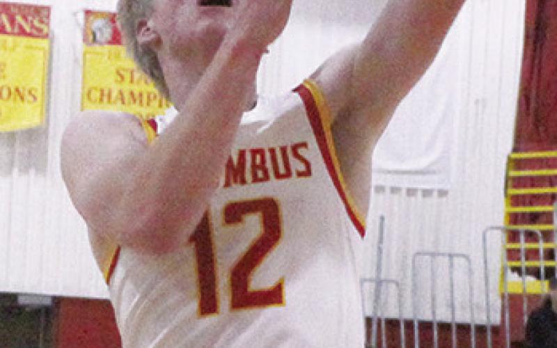 Titan Junior, Cole Youngblood, scored eight of his team-high, 17 points in the third quarter of the 6227, win over St. Paul, Tuesday, at the Columbus High School Gymnasium.