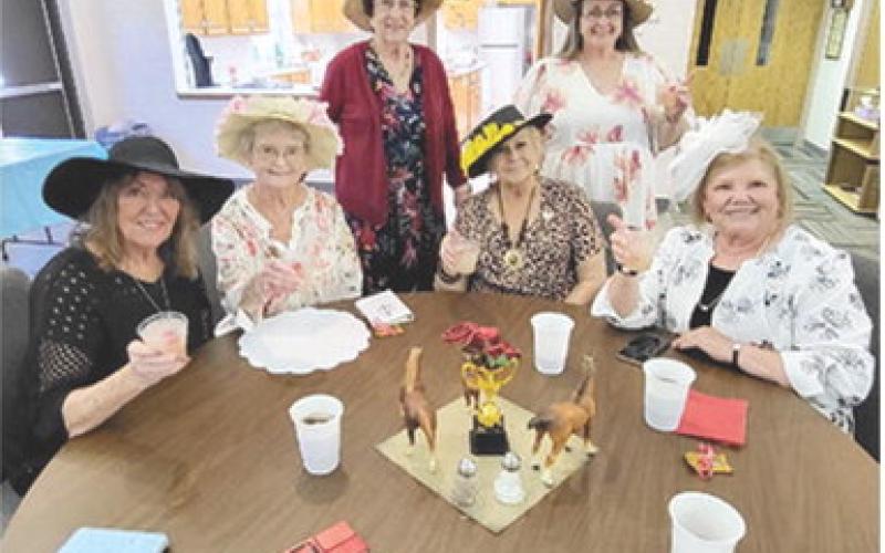 May’s meeting theme for the Baxter Springs Chapter BT of P.E.O. was “The Kentucky Derby.” Members wore fancy hats and played Kentucky Derby Bingo. Courtesy photo.