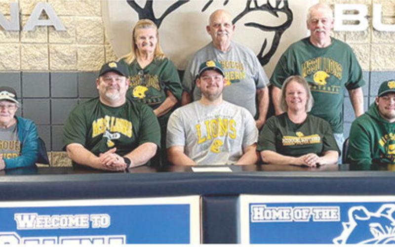 Riverton Ram Senior, Brayden Buckaloo, signed a National Letter of Intent to play football at Missouri Southern State University during his college career. He was surrounded by family, friends, and coaches during a signing ceremony at Galena High School. Those present for the photo are front row: Susie Buchannan; dad, Randy Buckaloo; Brayden Buckaloo; mom, Serena Buckaloo, and brother, Connor Buckaloo. Back row: Dewan Hewlitt, Michael Buchannan, and Jack Hewlitt.