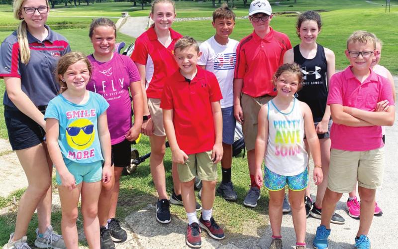 The Columbus Junior Golf Team participated in a tournament, Thursday, in Parsons at the Katy Golf Course. Two Lady Titans and one Titans brought home first place in their respective age divisions. Back row: Reese Grundy, Fallon Smiley, Mallory Thompson, Jayden Rodriguez, Jett Tanner, Natalie Wary and Amory Neely (hidden). Front row: Lyndee Smiley, Tanner Thompson, Alaina Smiley and Cooper Grundy. Courtesy Photo.