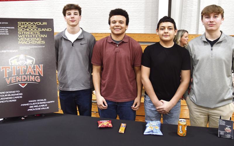 Titan Vending is the name of the company Trey Phillips, Thomas Bidwell, Gabe Marquez and Kannon Roberts presented at The annual Cherokee County Youth Entrepreneurship Fair was held March 5