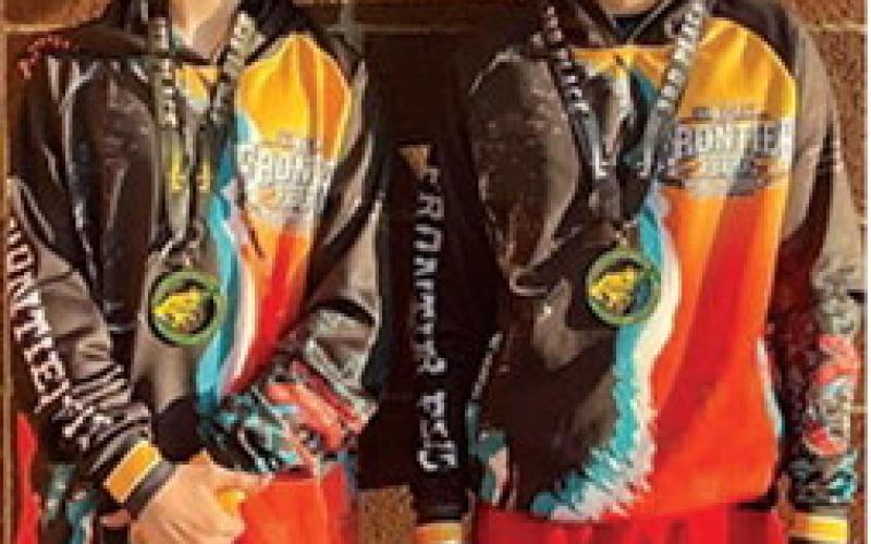 Lucas Natalini and Briggs Johnson, local mini wrestlers came away from the Bobcat Classic with third place and second place hardware, Saturday, in Basehor. Courtesy photo.