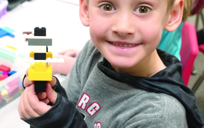 USD 493 students at Park Elementary took part in a number of activities related to the recent celebration of Kansas Day. Rowan Benedict shows off his interpretation of the Kansas State Salamander.