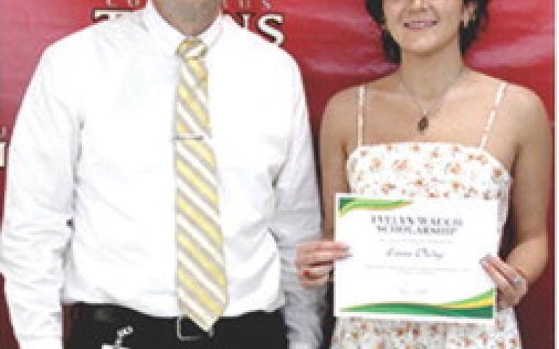 Emma Duling received the Evelyn Waugh scholarship from Waugh’s grandson and Central Elementary Principal, Aaron Rider, in the amount of $300 during the CUHS Senior Assembly, May 16 at the Columbus High School Gymnasium.