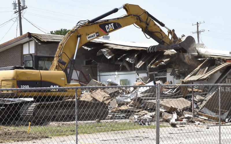 Another building of Columbus’ yesteryear has been reduced to rubble. The former health department located on East Walnut was razed on Monday by workers of B-3 Construction. A new structure is slated to be erected later this year and will house the Cherokee County Health Department.
