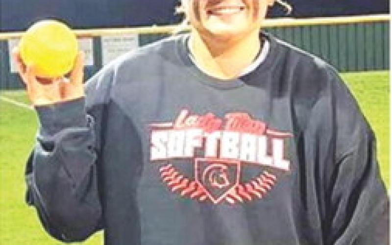Lady Titan Senior, Madisen Rand, knocked a solo home run over the centerfield fence to cap the score, 11-2, in the Columbus, CNC League, win over Baxter Springs, Monday, at the Field of Dreams. Courtesy photo.