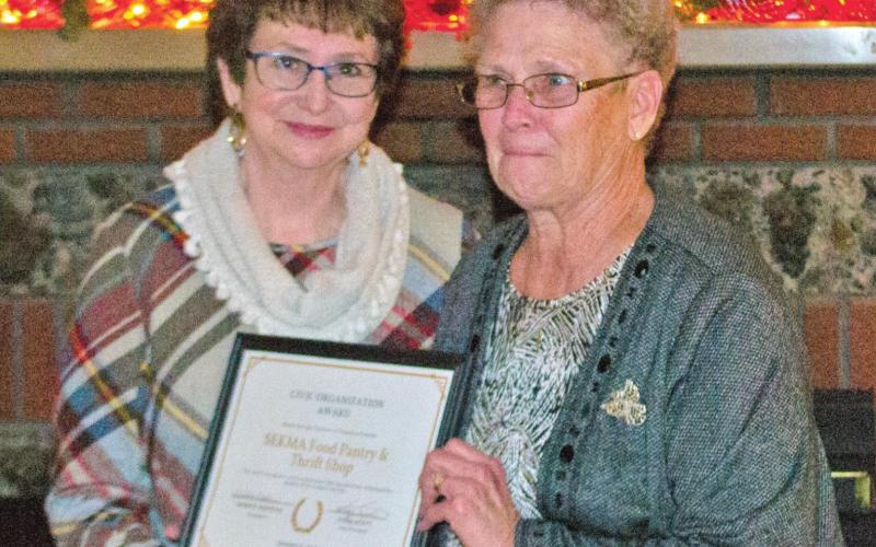 The Baxter Springs Chamber of Commerce Civic Organization of the year award went to the SEKMA Thrift Shop and Food Pantry with Ann McCorkle accepting the certificate from Debbie Hopkins, President of the Chamber of Commerce.