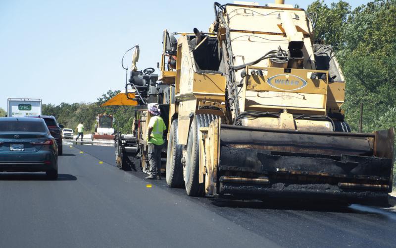 Fresh blacktop was being laid on the eastern two miles of Old US Highway 96 this week. By Thursday at noon, contractor Bettis Asphalt had the entire east bound lane, and more than one-third of the west bound lane completed. Drivers are encouraged to use caution in the area while crews work to complete the project ahead of the Labor Day weekend.