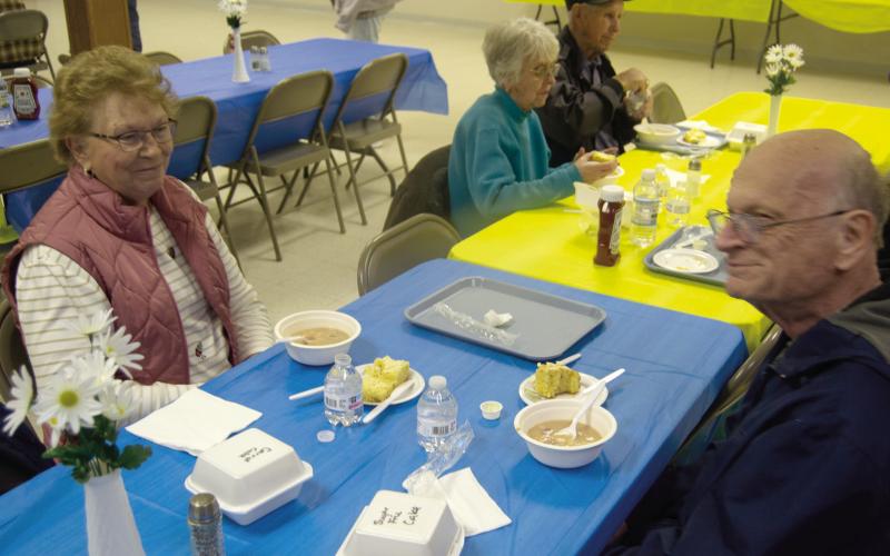 Alice and Ralph White were among those enjoying the recent bean feed sponsored by the Columbus Lions Club. The annual event always draws a crowd and is very popular with area residents.