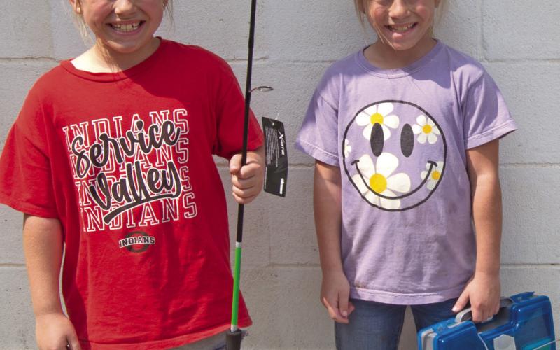 Mattie Godfrey was the 7 to 9 year old first place in the fishing contest with a 1.47 pound bass and sister Mia Godfrey was second with a 1.43 bass. Kenley Baxter (pictured above) was third.