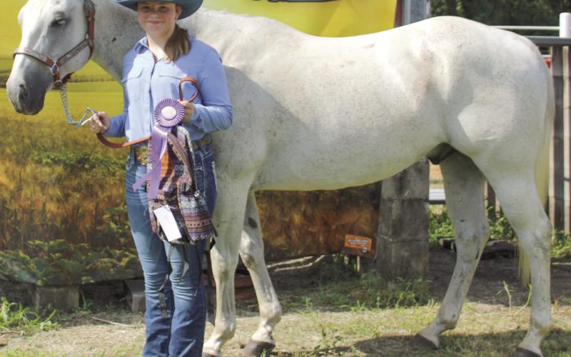 During annual Cherokee County Horse Show Annahleigh Wells was named Grand Intermediate Showman.
