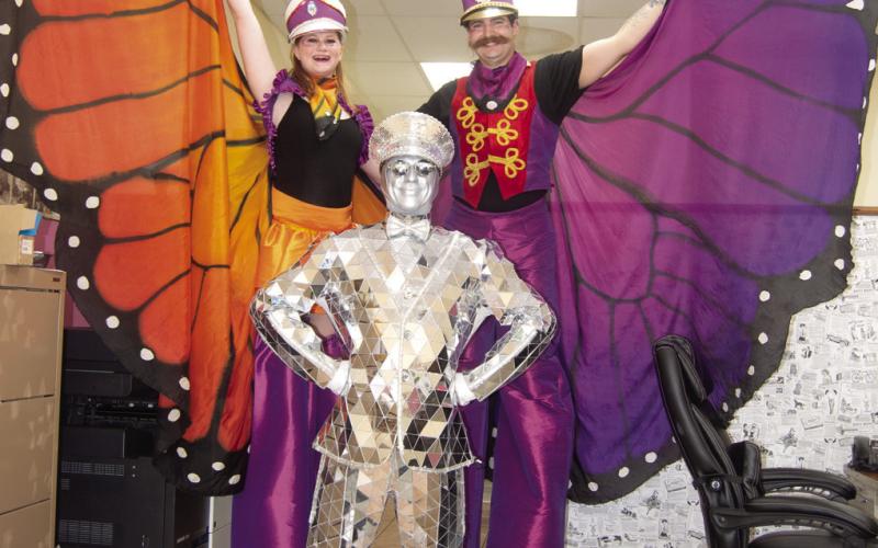Stilt walkers as well as other types of street performers will be at the annual Columbus Day Festival. Make plans to attend. Remember, the balloon regatta has moved to Southwest 20th Street this year.