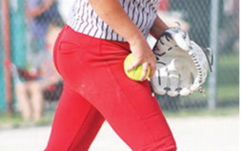 Lady Titan Junior, Morgan Richards, pitched the junior varsity game against Oswego, Thursday, at Rockette Field at the Community Field Ballpark.