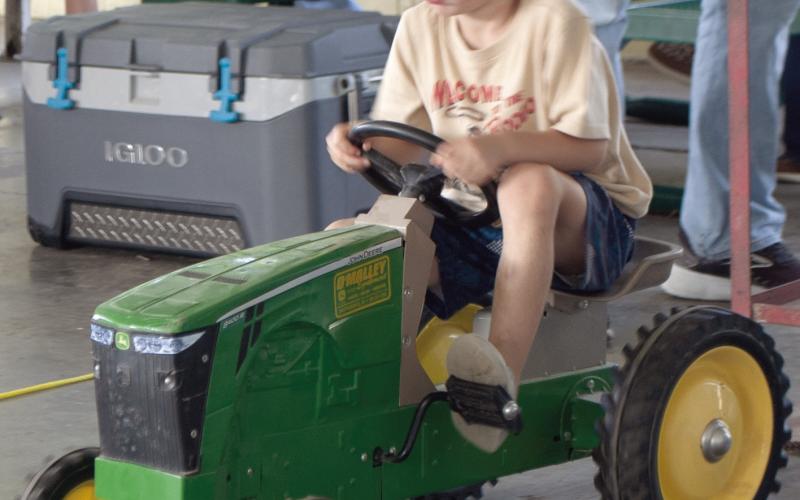 Younger children get to try their hand at this tractor. Winners in each division have the opportunity to compete at the Kansas State Fair.