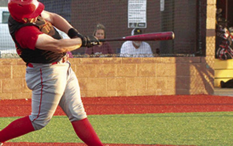 Kash Smith, Titan Freshman, crushed a three-run home run over the center field fence in the Columbus Summer Baseball League Junior Varsity game at Girard, Thursday. The Titans won the game, 6-4.