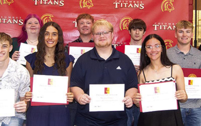 CUHS Seniors receiving scholarships from Pittsburg State University are front row: Korbyn Newberry, Brylie Johnson, Maddox Ochsner, and Katy Mooney. Back row: Robert Graham III, Ashlyn Ash, Kanyen Smith, Lydon Lovesee, and Syler Schuberger. David Hogard, PSU Representative presented the scholarships.