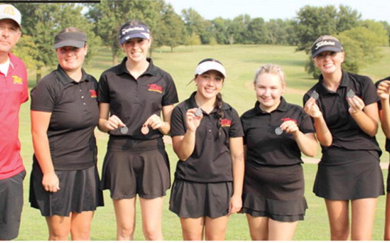 The Columbus Unified High School Lady Titan Golf Team hosted their season opener, Columbus Invitational, Thursday, at the Brush Creek Golf Course. Led by Cali Carpino, who placed second in individual scoring, the Lady Titans placed second in the team standings, three strokes behind Caney Valley. Team members are: Coach Jerry Smiley, Fallon Smiley, freshman; Natalie Wary, junior: Hannah Noel, junior; Amory Neely, junior; Cali Carpino, freshman; and Addison Johnson, freshman.