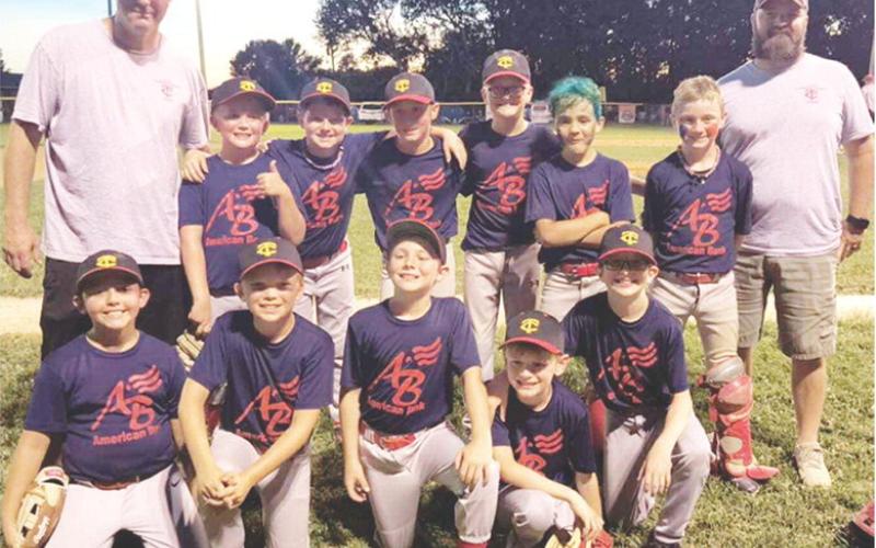The American Bank Team won two games Wednesday night to secure the Columbus Cal Ripken Minor (10U) League Title. Members of the team are front row: Sam Hardman, Kai Fellwock, Isaac Zahm, Connor Crain, and Matthew Niegisch. Back row: Coach Craig Hale, Trapper Clark, Gus Garrison, Brady Hale, Kolt Carter, Kross Davis, Lee Snow, and Coach TJ Carter. Courtesy photo.