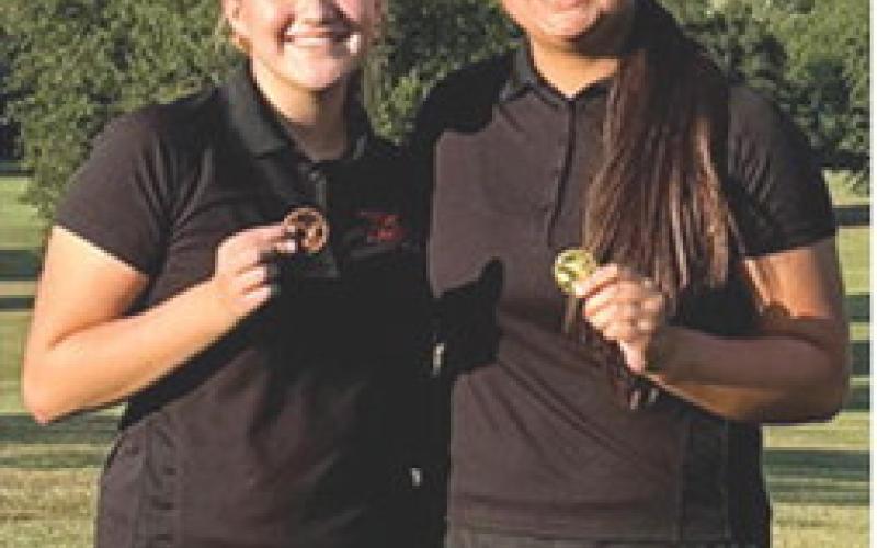 Lady Titan Kristen Linn, took first place and Elaina Garcia placed fourth in the Baxter Springs Junior Varsity Golf Tournament, Tuesday. The freshmen pair had rounds of 52 and 60 respectively on the day for Columbus. Courtesy photo.