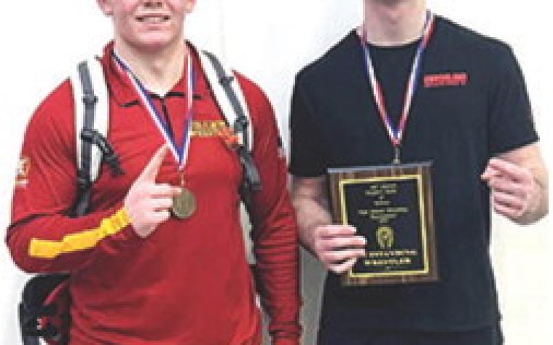 Titan Freshman, Kash Smith, placed first at the 62nd People’s Bank Wrestling Tournament in Seneca, Mo., Saturday. Sophomore, Mason O’Banion won his weight class and was named Outstanding Wrestler. Complete tournament results can be found on page seven of today’s edition. Courtesy photo.