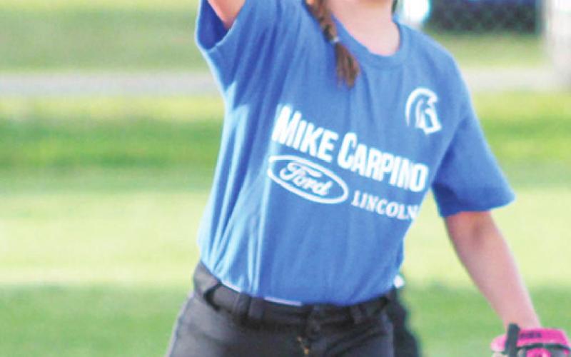 Cami Carpino makes a throw to first from her position at short stop during a mid-June game for the 8U Mike Carpino Team.