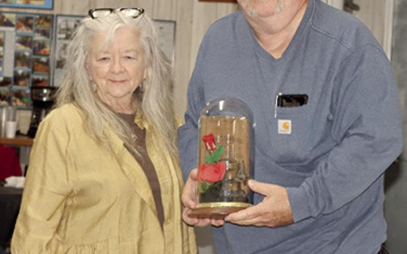 The annual Miners Lamp award was presented to Joyce and Roe Parsons at the Big Brutus annual meeting at the Weir Senior Center Saturday evening. The Parsons were recognized for their volunteer efforts over the years on behalf of Big Brutus. He was particularly recognized for the playground equipment he donated to the Big Brutus Park and the work repairing the bell from the City of West Mineral. Photo by Emmett Sullivan.