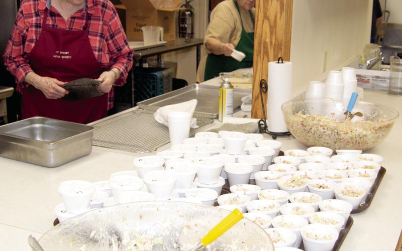 Judy Pierce, member of the St. Bridget’s Altar Society was helping out at the annual fish fry.