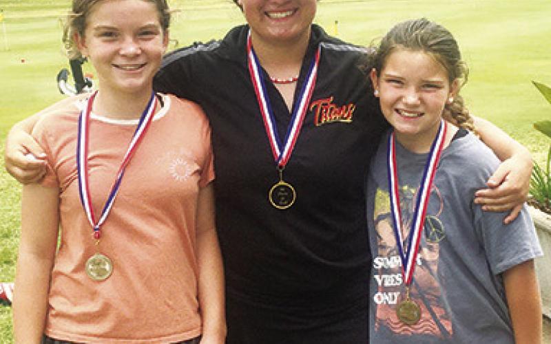 Lyndee Smiley placed second in the girls 9-11 age group at the SEK League Junior Golf Tournament in Independence, Thursday. Fallon Smiley took first place in the girls 12-14 age division, and Alaina Smiley finished fourth in the girls 9-11 age division. The sisters, representing the Columbus Rec Junior Golf Program, each earned a medal for their collections.
