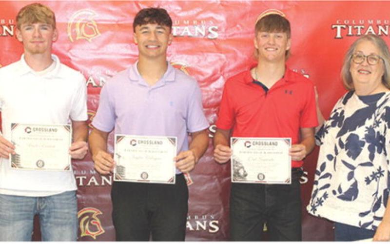 Hunter Ruddick, Jayden Rodriguez and Cal Saporito, CUHS Seniors, received recognition of achievements for the Crossland Kickstart Program from Marta Brown, Crossland Representative during the Senior Assembly, May 15, at the Columbus Unified High School Gymnasium.