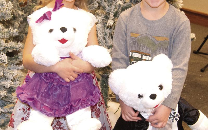 Baxter Springs Little Miss Holiday Raegan Tanner, 5, and Little Mister Holiday, Lucas Sandefer, 3, were crowned Saturday, December 2 and received the teddy bears and crowns. The youngsters were in the Christmas Parade later in the day. The youngsters raised a total of $3,257 in ticket sales.