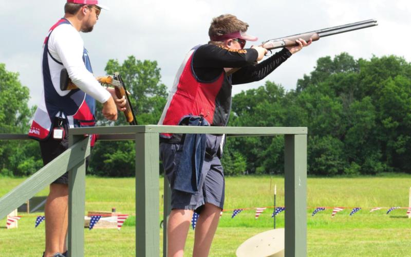 Eleven year old Noah Ruby (right) of San Antonio, Texas, was competing with the other shooters at 5-Stand competition on Tuesday morning. The young man has been shooting for the past four years. His family members do not compete, he became interested and is now competing with the best.
