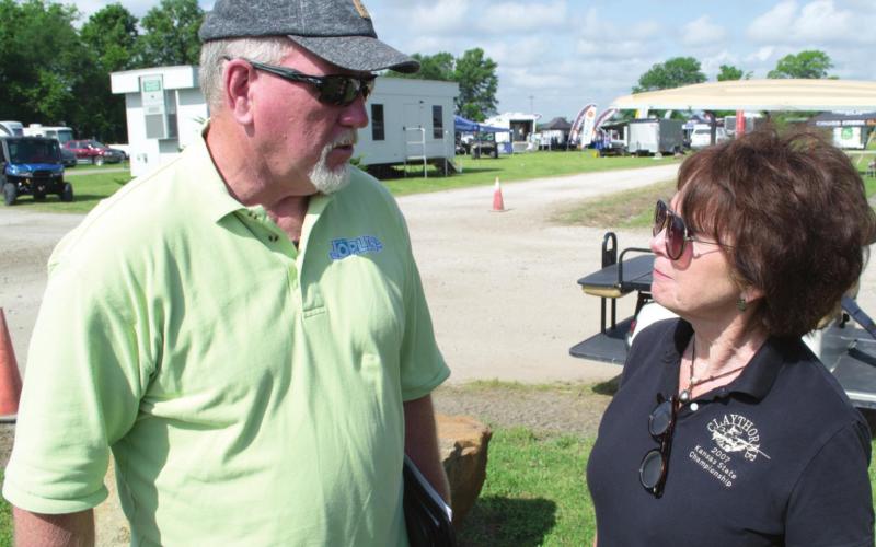 Joplin Convention and Visitors Bureau Director Patrick Tuttle visited with Frieda Lancaster, co-owner of Claythorne Lodge as the U.S. Open got underway earlier this week.