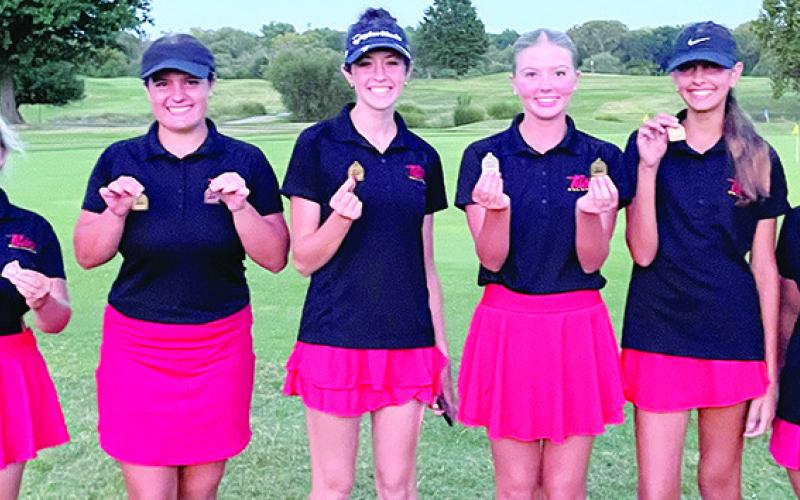 The Columbus Lady Titan Golf Team picked up their fourth tournament team win of the season in the predominately SEK League Tournament in Independence, Tuesday. Cali Carpino, Fallon Smiley, Amory Neely, and Natalie Wary placed in the top 11 individually to earn the tournament team championship with 376 combined strokes. Caney Valley was second, 18 strokes behind the winners with a 394 total. Team members are Amory, Fallon, Natalie, Cali, Addison Johnson, and Hannah Noel. Courtesy photo.