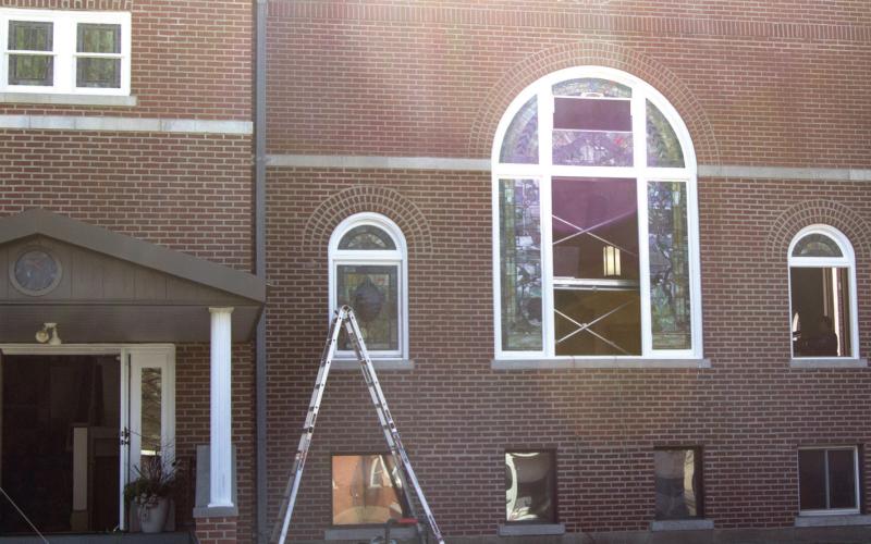 After being removed over six months ago the new stained-glass windows are being reinstalled at the First Christian Church. The renovation of the windows cost in excess of $175,000
