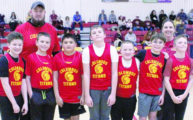 Members of the sixth grade Columbus Recreation Titan Basketball Team were introduced February 10 at the Titan varsity basketball games with Girard. Jake Wary, Trevor Lacen, Chance Briggs, Tanner Thompson, Kip Noel, Kasen Sallee, and Jace Mooney are shown with their coaches Adam Sallee and Ryan Lacen.