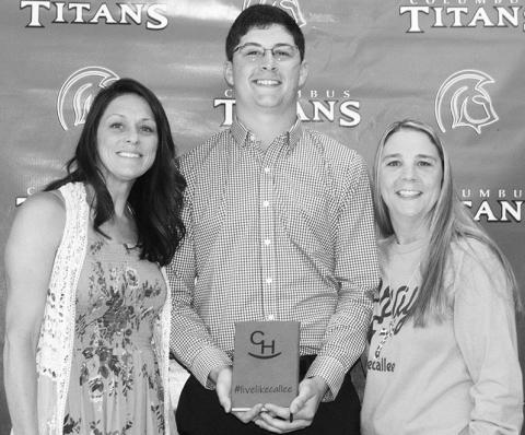 Cole Minor received the Callie Henson Memorial from Angel Tate and Ryan Lacen, Henson Family Friends, in the amount of $500 during the Senior Assembly at the Columbus Unified High School Gym, May 19.