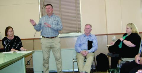 Executives from the Department of Transportation visited with Cherokee County Commissioners and residents Monday morning. The discussions centered around the construction of US69 four-lane highway through Cherokee County.