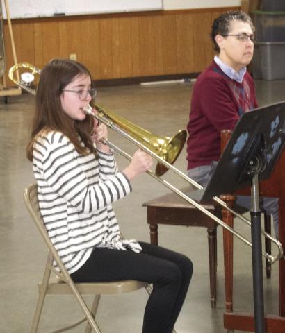 Performing a trombone solo for the judges, Kora Welch was participating in Cherokee County 4-H Days. Gae Phillips accompanied Welch on piano.