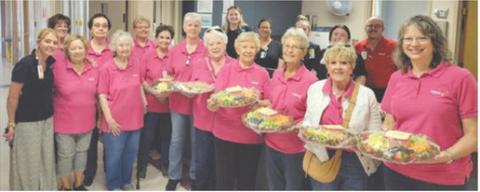 Members of Columbus’ Mercy Auxiliary delivered fruit trays and cookies to staff at the Columbus hospital. The group was celebrating Hospital Appreciation Month. Courtesy photo.
