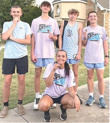 Members of the Southeast Cross Country Team ran away with five medals, four season bests, and one career best time at the Girard Invitational Meet, Thursday at Greenbush. Runners earning medals are James Maxton, Tucker Sutton, Chris Archey, Hudson Locke and Jackie Robinson in front. Photo by Julie Jones