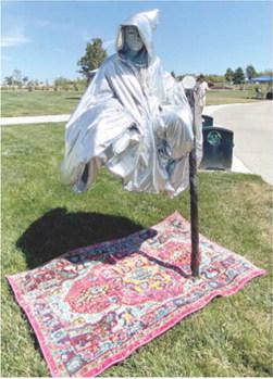 Erin Wilson, also known as Erin the Extraordinary, will be performing during Columbus Day. She is a stiltwalker and also has living statue acts. Courtesy photo.