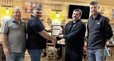 At the annual Columbus Fire Department Christmas party, firefighter/driver Dylan Koehler received a Certificate of Excellence from Assistant Chief Steven Burton Sr., Deputy Chief Jason Allison and Chief Steven Burton. “Dylan being a new member stepped up and maintained one of the highest percentages for attending emergencies this year. He was always there when we needed him no matter the time,” said Chief Burton. Courtesy photo.
