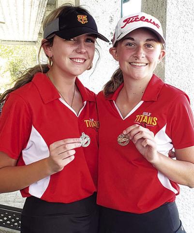Lady Titan Junior, Reese Grundy placed second in the Chanute Varsity Invitational, Monday. Lady Titan Sophomore, Mallory Thompson, placed third in the field of 42 golfers. Courtesy Photo.